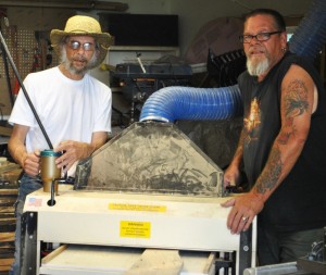 Jim and his buddy, Daren Pautzke (right), put miles of oak through Jim’s Woodmaster Molder/Paner, creating flooring and molding during the restoration of Jim and Lynn’s Victorian home.